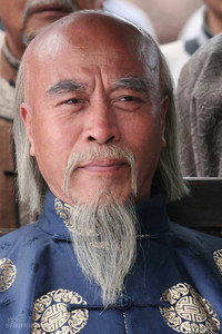 الممثل Qilong Hua